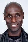 Lance Reddick isCharon