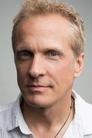 Patrick Fabian isBishop Edwards