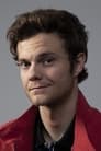 Jack Quaid isMarty Comer