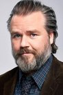 Tyler Labine isBurke
